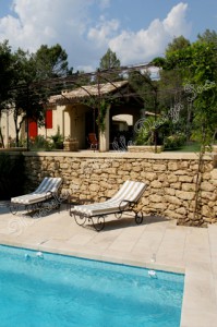 french limestone tiles around pool